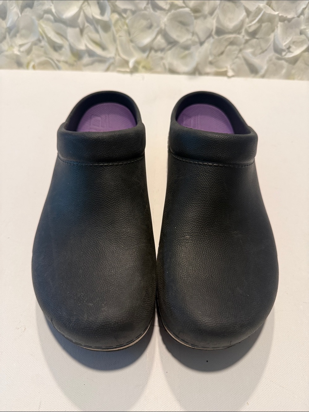 Dansko Black Leather Slip-On Clogs with Purple Footbed